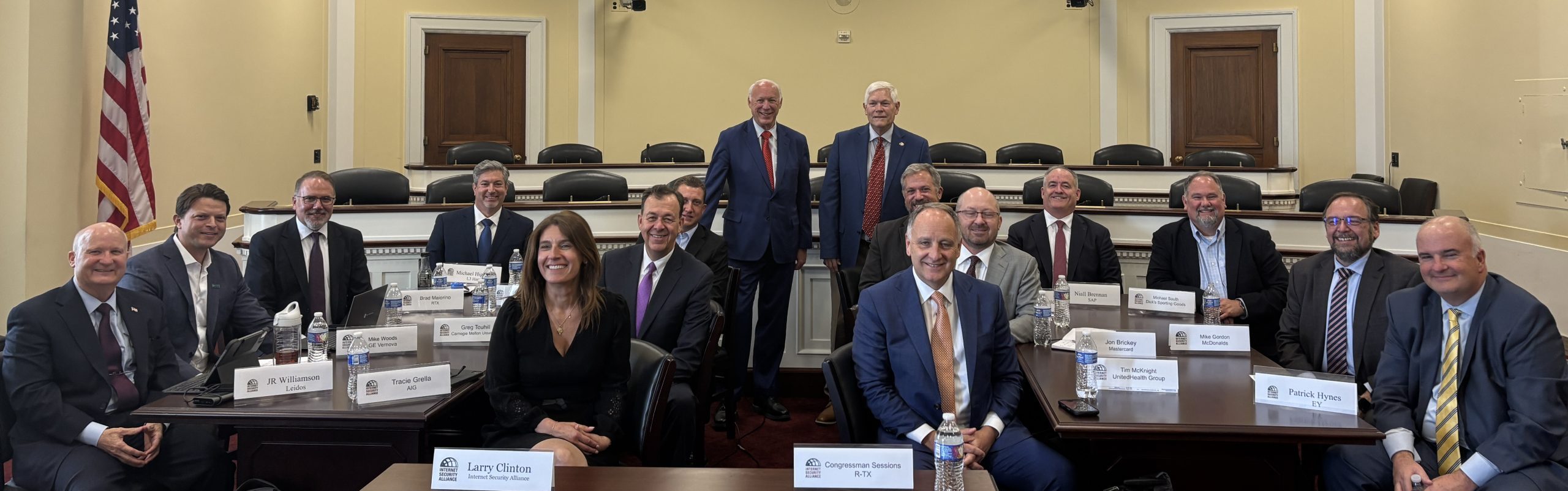 Photo of ISA Board Members meeting with Representative Pete Sessions, R-TX in House Oversight Committee Room (seated at tables)